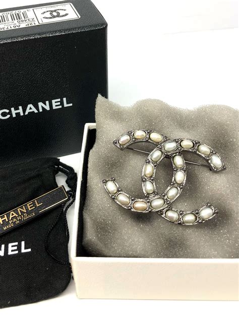 chanel fake brooch|authentic chanel counterfeit.